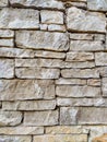 Modern uneven bricks made of stone and rock making an interesting wall for indoors and outdoors