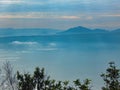 Cool morning views and bright blue skies at the paragliding attraction, Macau Duo, Malalo, West Sumatra Royalty Free Stock Photo