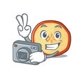 Cool Photographer apple chips character with a camera Royalty Free Stock Photo