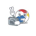 Cool Photographer beach ball character with a camera Royalty Free Stock Photo