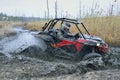 Amazing UTV driving in mud and water at Autumn day