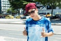 Cool rapper with baseball cap in the city Royalty Free Stock Photo