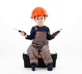 Cool repairman in hardhat with pliers and screwdriver on white