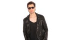 Cool rock and roll man wearing leather jacket and sunglasses Royalty Free Stock Photo