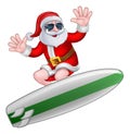 Cool Christmas Santa in Shades Surfing Royalty Free Stock Photo