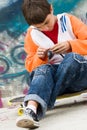 Cool skater fixing his headset