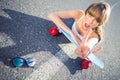 Cool skater girl doing rock and roll hand gesture