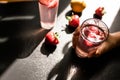 Cool strawberry-infused lemonade. A revitalizing beverage made with organic strawberries and zesty lemon. The drink is Royalty Free Stock Photo