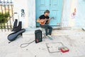 A cool street musician guitar player in the center of Athens Royalty Free Stock Photo