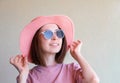 Cool student with glasses. Caucasian female university student does not look at the camera, smiling happy Royalty Free Stock Photo