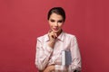 Cool student woman with book. Caucasian female university student looking at camera smiling happy Royalty Free Stock Photo