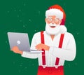 Cool stylish Santa Claus is standing with a laptop in his hands. Santa in a white shirt with suspenders is working at a personal Royalty Free Stock Photo