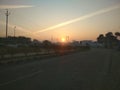 A cool sunrise looking sun sharing his rays to save s from winter two sign mark presenting luck of todays pleasent day.