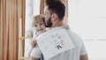 Cool surprise from daughter. I love you, dad. Handsome young man at home with his little cute girl. Happy Father day Royalty Free Stock Photo