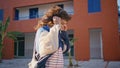 Cool teen girl listening music by earphones at sunny weekend stroll close up. Royalty Free Stock Photo