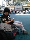 Cool Teenager Boy Waiting at the Vancouver Airport