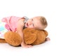 Cool toddler girl is lying on a big plush toy Royalty Free Stock Photo