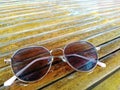 cool and trendy glasses on a bamboo table