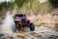 Cool view on hard ride UTV in muddy water