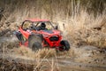 Cool view on hard ride UTV in muddy water