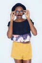 Cool, woman and portrait with mustache in studio with hipster fashion and funny model in background. African, person and Royalty Free Stock Photo