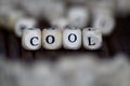 Cool word with wooden cubes