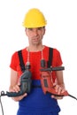 Cool worker with two drills Royalty Free Stock Photo
