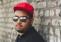 Cool young african boy in red snapback cap Royalty Free Stock Photo