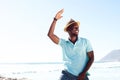 Cool young african man dancing at the beach Royalty Free Stock Photo