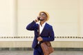 Cool young african man talking on mobile phone Royalty Free Stock Photo