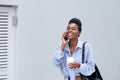 Cool young black woman talking on cell phone Royalty Free Stock Photo