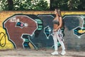 Cool young woman at a public graffiti park Royalty Free Stock Photo