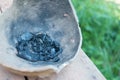 The cooled coals in a clay pot. Nature, background, or texture Royalty Free Stock Photo