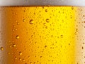 Cooled glass of beer close-up.  Small water drops on cold surface of beer glass Royalty Free Stock Photo