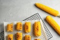 Cooling rack with grilled corn cobs Royalty Free Stock Photo