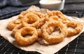 Cooling rack with homemade crunchy fried onion rings Royalty Free Stock Photo