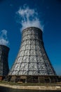 Cooling tower of nuclear power plant against blue sky Royalty Free Stock Photo