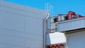 Cooling tower on roof top of building. Industrial air cooling system. Air chiller. Unit of air conditioner. Air cooled chiller Royalty Free Stock Photo