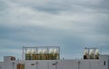 Cooling tower on roof top of building. Cooling system. Air cooled water chiller. Industrial cooling tower outside building. HVAC Royalty Free Stock Photo