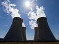 Cooling towers with contrejour lighting and beautiful sky Royalty Free Stock Photo