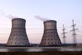 Cooling towers and electrical transmission tower Royalty Free Stock Photo
