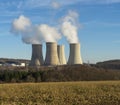 Cooling towers of nuclear power plant  with cloudy sky in the background. Nuclear power station. Royalty Free Stock Photo