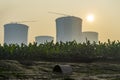 Cooling towers of a nuclear power plant at dawn. Ruppur, Bangladesh