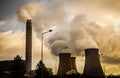 Cooling towers factory industrial spewing pollution and water vapour Royalty Free Stock Photo