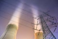 Cooling towers and power transmission tower Royalty Free Stock Photo