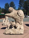 Stone sculpture of lion and cubs, Coombs, BC Royalty Free Stock Photo