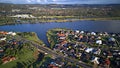 On The lake Regatta Waters Parkland Gold Coast Grass play area House Estate next to Coomera River Hope Island, Royalty Free Stock Photo