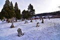 Coon valley cemetery in Winter with the 1876 evangelical Norwegian Lutheran church and drifters area bluffs covered in snow.