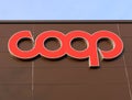 Coop logo on a store facade. It is the symbol of the largest italian supermarket chain, part of a system of Italian consumer coope Royalty Free Stock Photo