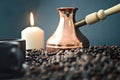 Cooper Turkish coffee pot, coffee beans, white candle Royalty Free Stock Photo